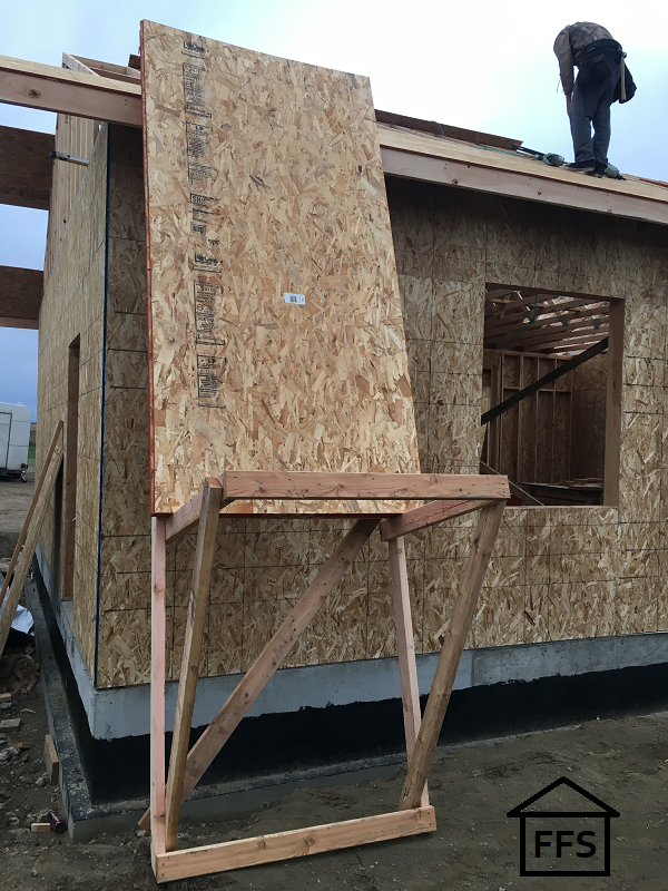 DIY plywood sheeting holder. Finish roof framing. How to build your own house. 