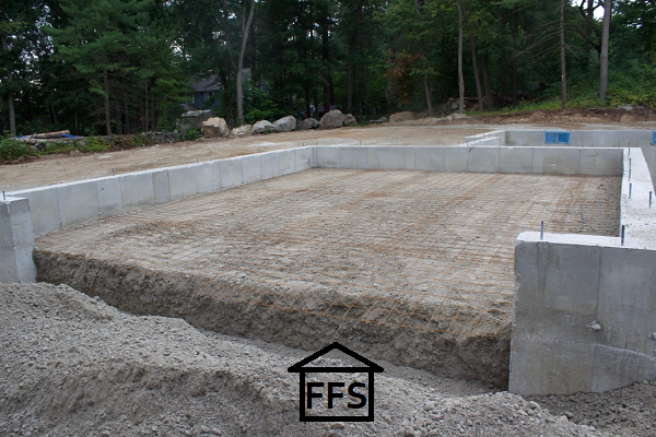 Preparing your foundation for your new home. Laying rebar, setting forms, pouring concrete. How to build your own house. General contract, save money. 